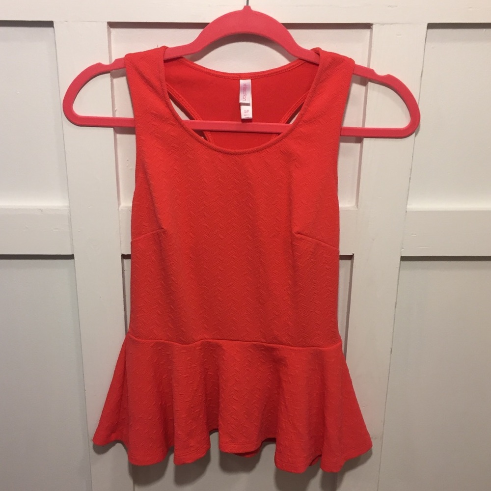 Coral Peplum Top